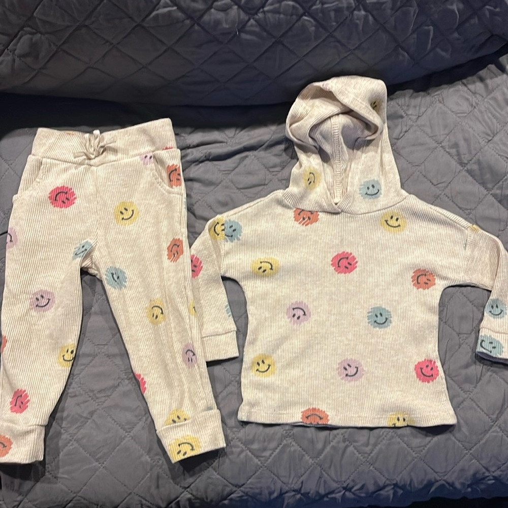 Light tan two piece toddler outfit.
